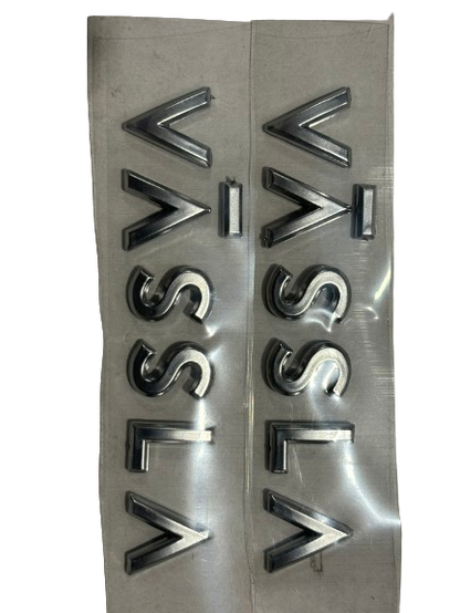 Vässla Side emblem pair